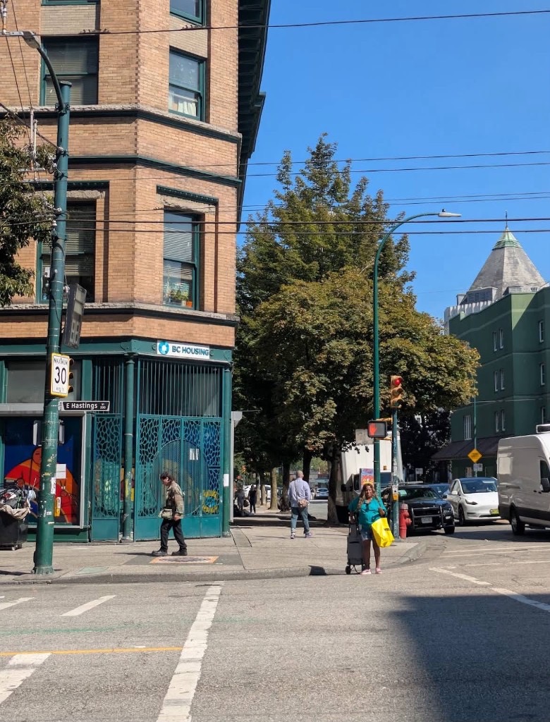 Urban residential street with BC Housing property on East Hastings